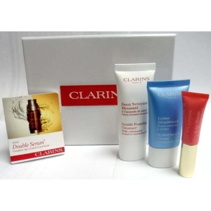 CLARINS Skin Care Travel Kit 4 piece serum lotion cleanser lip balm women NEW TRAVEL SET